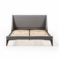 Upholstered bed frame with wooden slats and contemporary gray fabric design